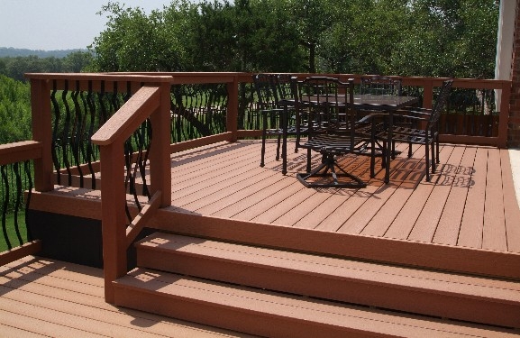 Split-Level Composite Deck with Elegant Wrought Iron Grillwork 